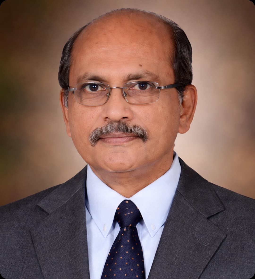 Dr. George John